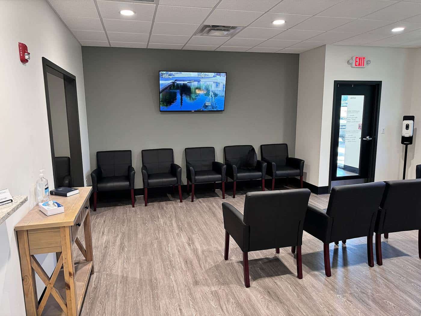 A clinic waiting room with chairs