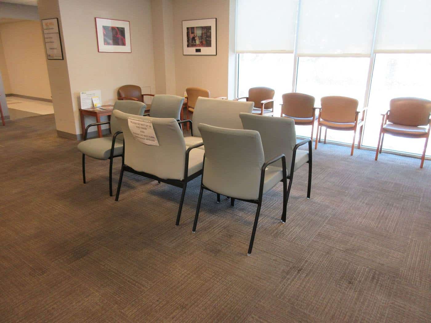 A waiting room with distanced seating