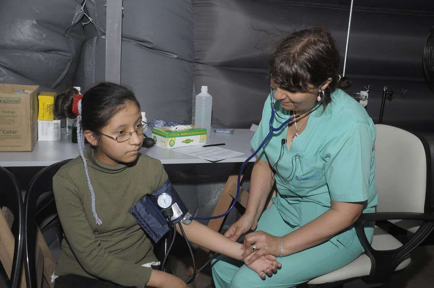 A blood pressure measurement being taken